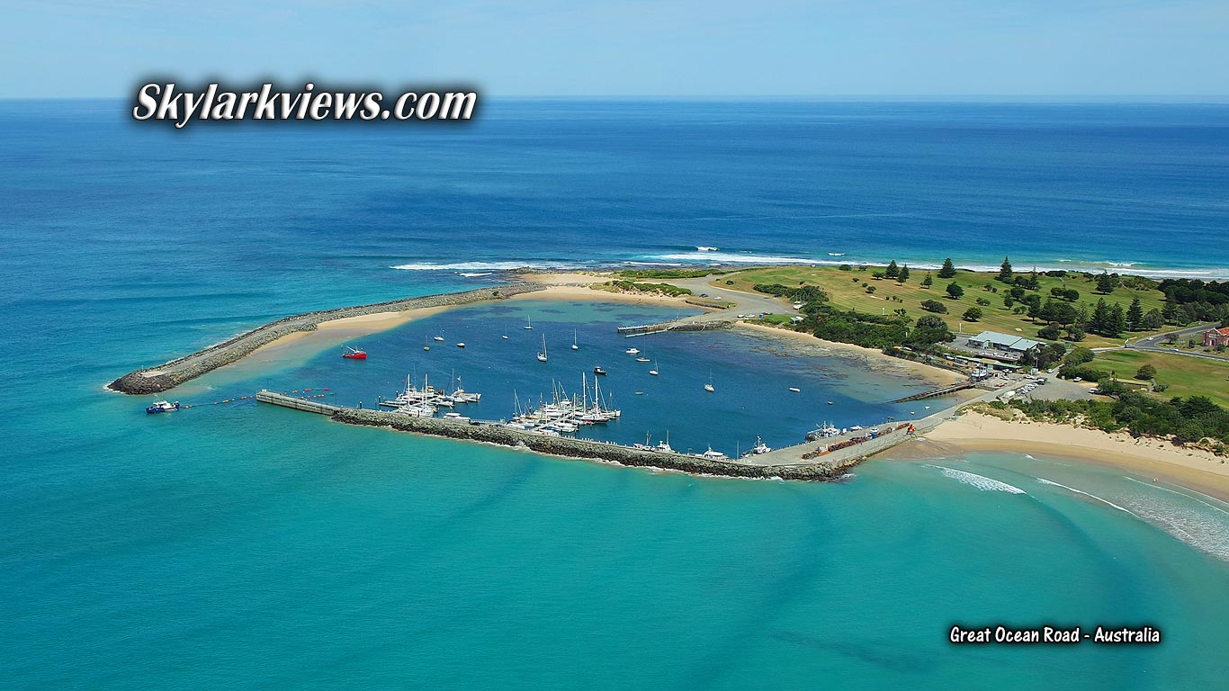 marina, turquoise and blue ocean - aerial view