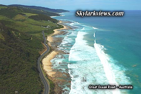 road along coast, rough ocean