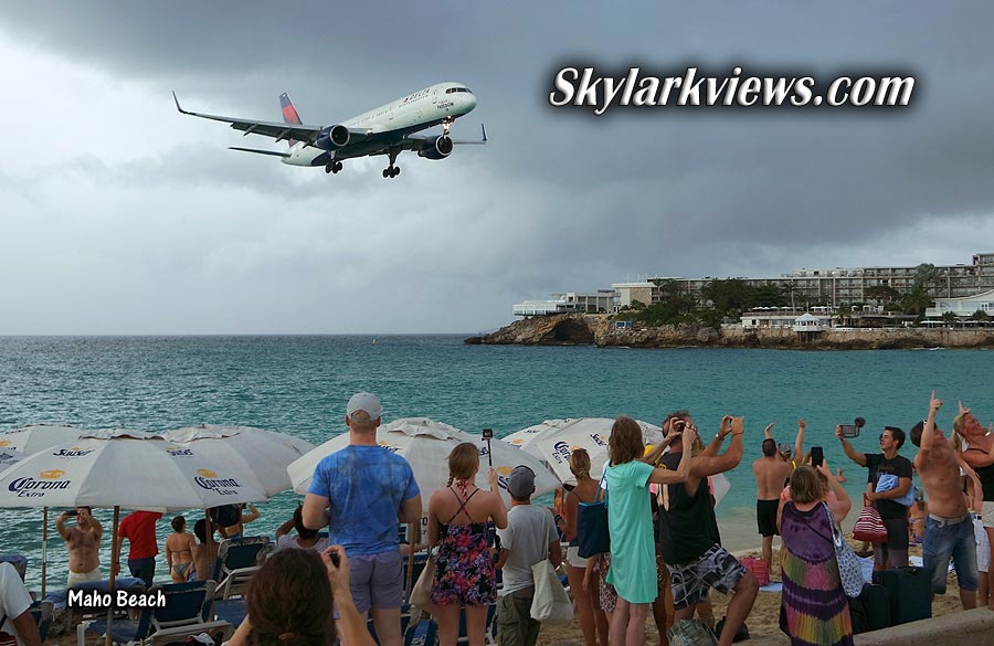 people at beach, 757 approaching