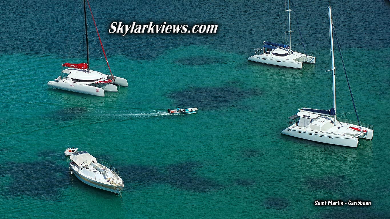 trimaran, catamaran, sailboat seen from above